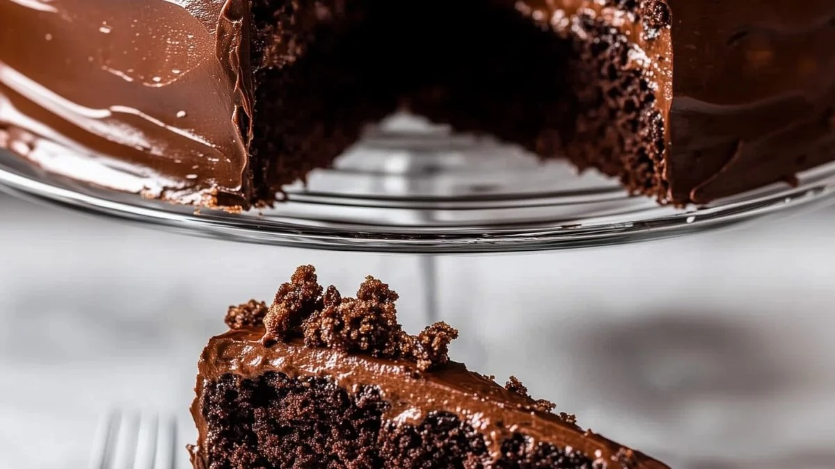 Cinematic overhead view of a decadent Chocolate Crunch Cake with crunchy chocolate shards and caramelized nuts