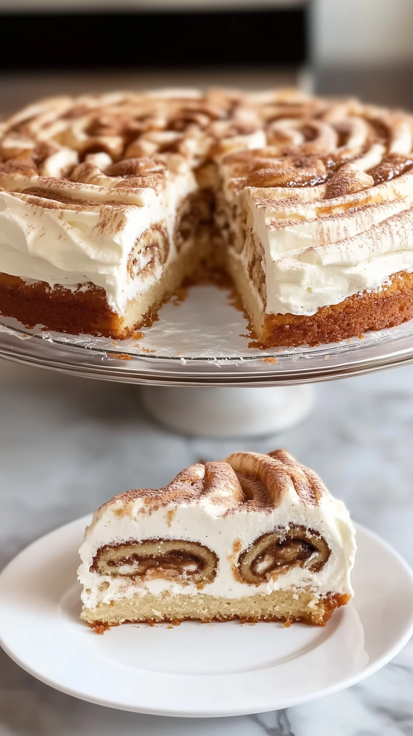 Close-up of a cinnamon roll poke cake topped with cream cheese glaze and cinnamon sugar swirls on a wooden board